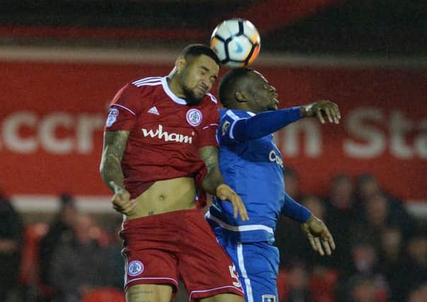 Ben Richards-Everton and Mike Fondop challenge for a high ball.
Accrington Stanley v Guiseley AFC.  FA Cup 1st round replay.  WHAM stadium.
14 November 2017.  Picture Bruce Rollinson