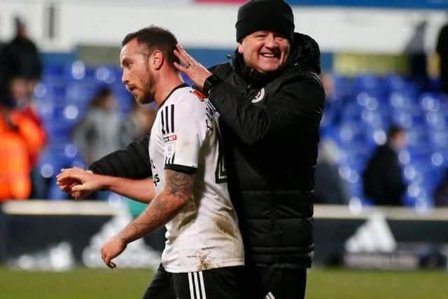 Chris Wilder with Blades midfielder Samir Carruthers after United's 1-0 win over Ipswich Town on Saturday