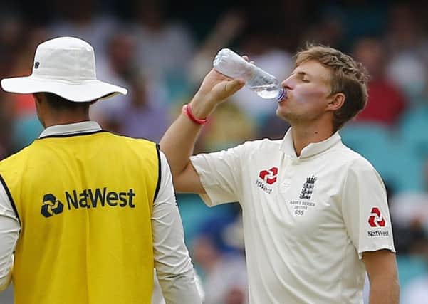 England's Joe Root takes a drink  during day five of the Ashes Test match at Sydney Cricket Ground.Pic: Jason O'Brien/PA Wire.