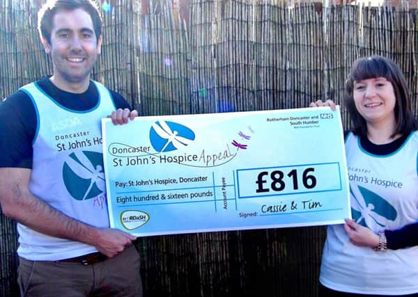 Cassie Beedle and Tim Webster took part in the Sheffield 10k and have now collected in their sponsorship money and handed it over to St Johns Hospice, Balby, Doncaster.