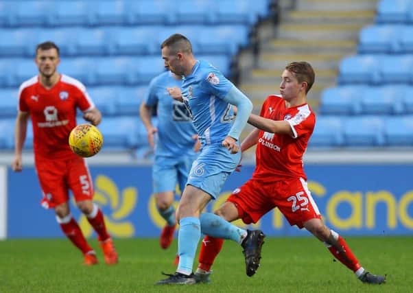 Picture by Gareth Williams/AHPIX.com; Football; Sky Bet League Two; Coventry City v Chesterfield FC; 01/01/2018 KO 15.00; Ricoh Arena; copyright picture; Howard Roe/AHPIX.com; Louis Reed challenges Coventry's Jordan Shipley