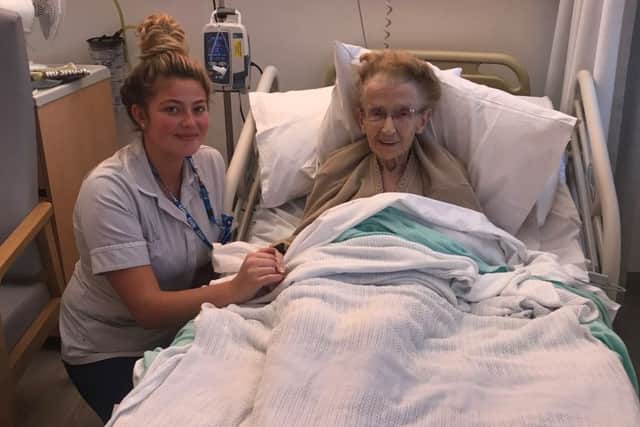 A patient receiving care in the new unit