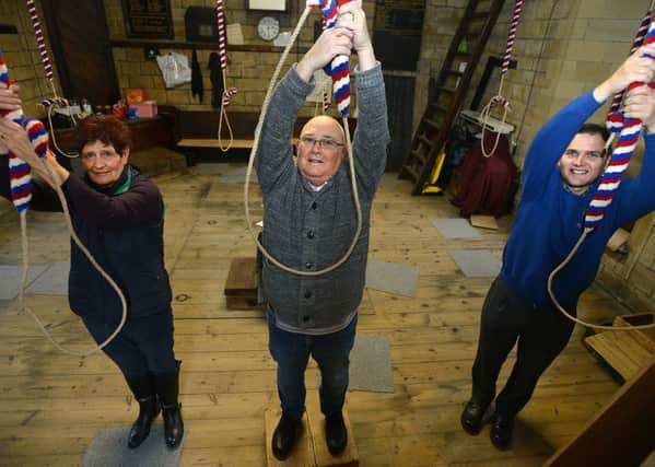 Newspaper: Dewsbury Reporter Series.
Story: Mirfield's St. Mary's church bell ringers are 'a peeling' (appealing) for new ringers as not only are they in decline, but their Tower Captain, Mr. Ian Ackroyd, retires at Christmass 2017.
Pictured: Molly Pratt, Tower Captain Ian Ackroyd and Mark Jennings.
Reporter: Chris Lever.
Photographer: Andrew Bellis
email: andrewbellisphotography@gmail.com
Twitter: @SnapperAndrewB
Mobile: 07885 426 523
Photo date: 20/11/17
Picture ref: AB267a1117