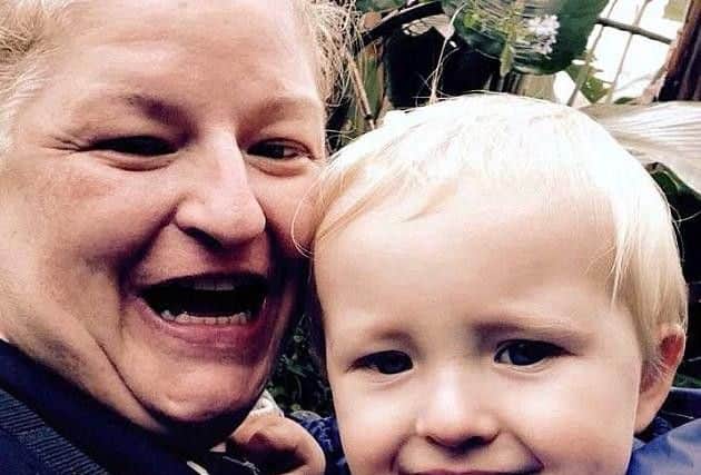 Joanne Curren with son Noah. (Photo: SWNS).