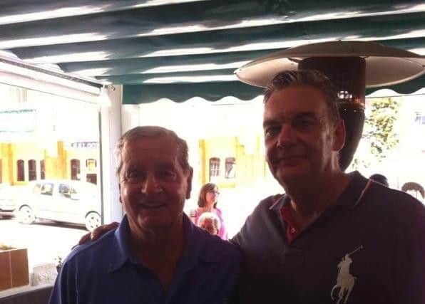Former footballer Frank McClintock pictured with Bar El Bosque owner Brian Wise.