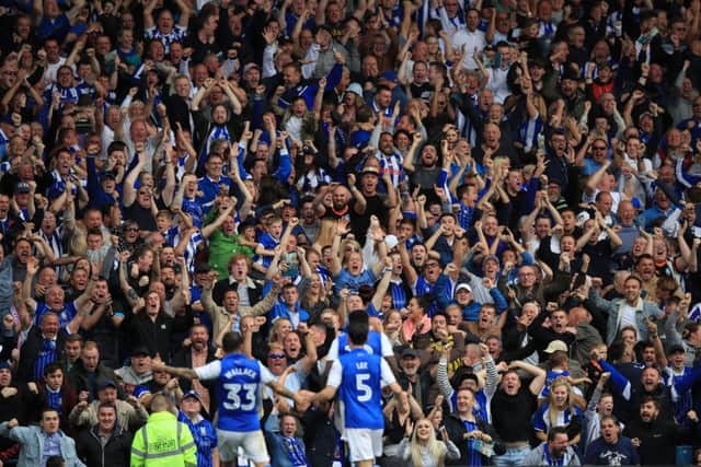 Sheffield Wednesday fans celebrate a goal during the Sky Bet Championship match against United at Hillsborough