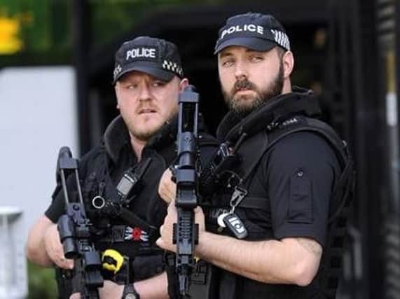 Armed officers are involved in the derby day policing operation in Sheffield today