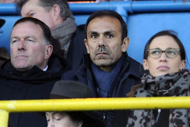 New Owls boss Jos Luhukay watches from the stands sat between his coach Remy Reynierse, left, and Owls chief executive Katrien Meire.