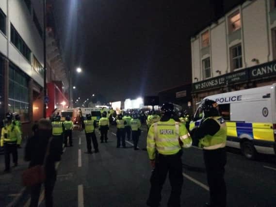 Police prepare for fans leaving Bramall Lane after the game.