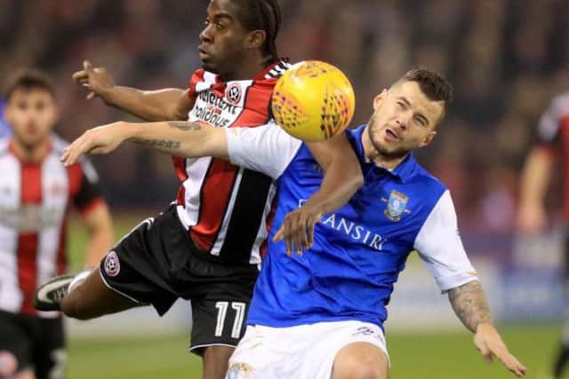 Daniel Pudil (right) battles with Clayton Donaldson in Friday night's Sheffield derby