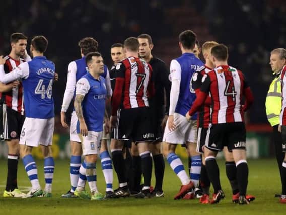 Sheffield Wednesday and Sheffield United players shake hands after the goalless derby at Bramall Lane