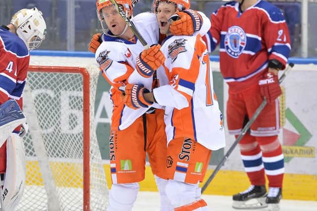 Mark Matheson enjoys his goal against the hosts, here in Belarus