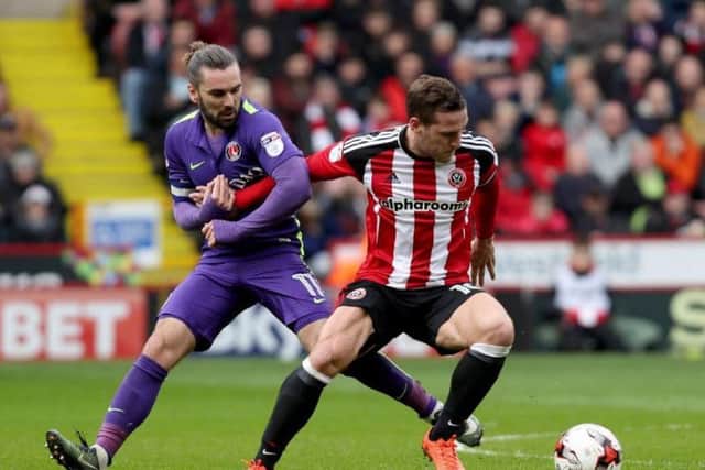 Ricky Holmes should be confirmed as a Sheffield United player on Monday