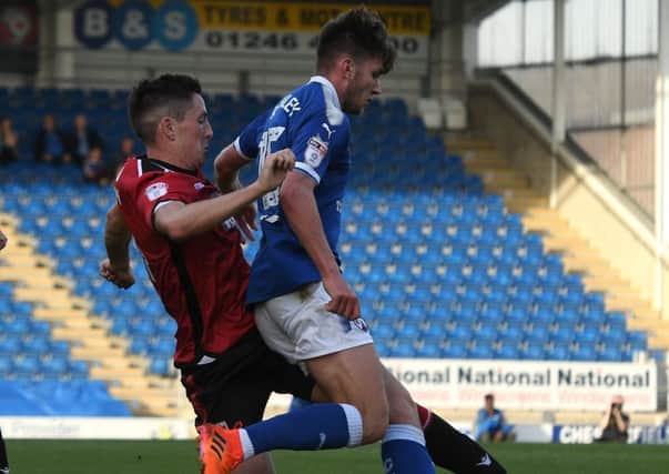 Picture Andrew Roe/AHPIX LTD, Football, EFL Sky Bet League Two, Chesterfield Town v Morecambe, Proact Stadium, 14/10/17, K.O 3pm

Chesterfield's Joe Rowley is tackled by Morecambe's Luke Conlan

Andrew Roe>>>>>>>07826527594