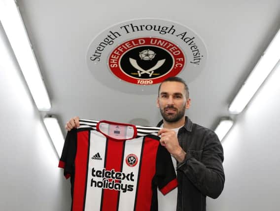 Ricky Holmes at his Blades unveiling