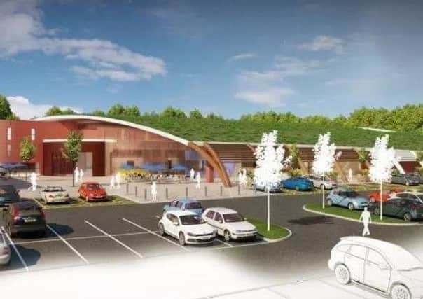 How the service station planned by Extra at Smithy Wood could look