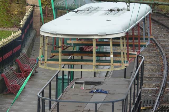 The roof of the tram being lifted off as part of the restoration at Crich