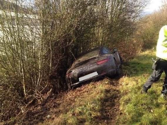 Police tweeted this photo of a car which crashed off a road in Dronfield, just south of Sheffield (photo: Derbyshire Armed Response Unit)