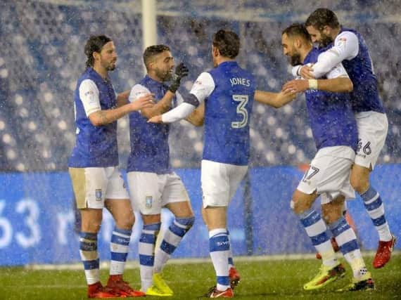 Sheffield Wednesday players celebrate with goalscorer Marco Matias after he put them in front against Carlisle. Pic Steve Eliis