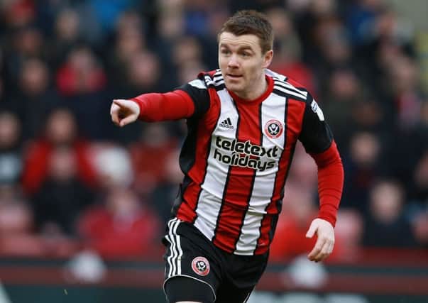 John Fleck was fortunate not to be injured by Ross Wallace, says Matthew Bell: Simon Bellis/Sportimage