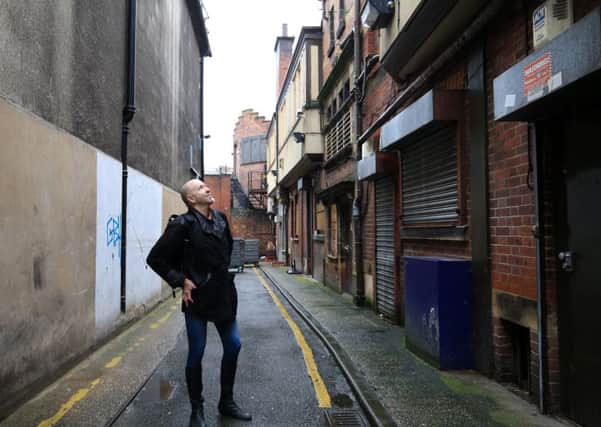 Dan Kahn is calling for Sheffield's 'hidden streets' - small rights of way, backstreets, lanes and alleyways that are part of the historic fabric of the city - to be properly recognised, highlighted and used. He thinks many are at risk of being forgotten or built over as redevelopment work gathers pace. Dan is pictured at Black Swan Walk. Picture: Chris Etchells