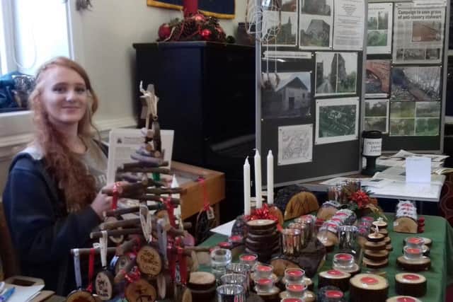 Alanna Hurman, 14, who with her sisters has raised 435 by making and selling 'Dreams of Zion' Christmas crafts.