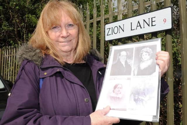 Penny Rea with photos of Mary Anne Rawson and her family outside the Zion Graveyard in Attercliffe.