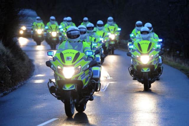 Police officers led the funeral cortege