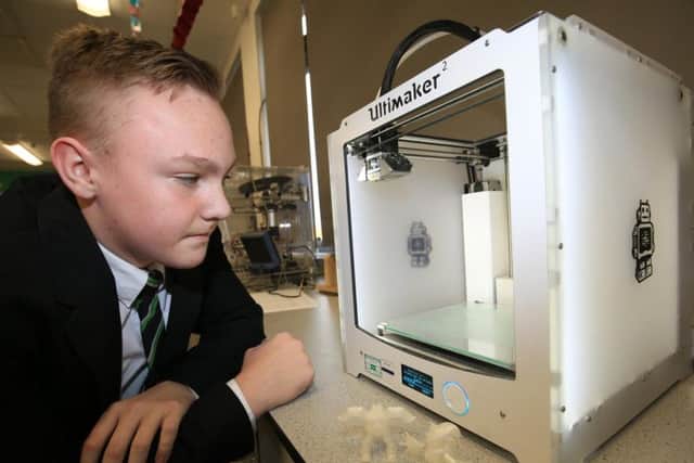 Jack Shepherd working with a 3D printer