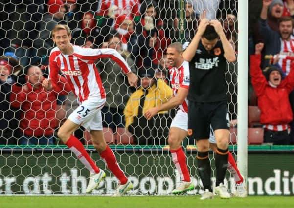 Stoke City's Peter Crouch celebrates scoring the only goal against Hull.