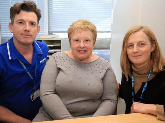 Janet Blair has praised the innovative MS urology clinic at the Royal Hallamshire Hospital which has helped with her condition. The service has led to a decline in the number of hospital admissions resulting from MS-related urinary tract infections. Janet is pictured with MS Nurse Specialist Liam Rice and Consultant Urological Surgeon Sheila Reid. Picture: Chris Etchells/The Star