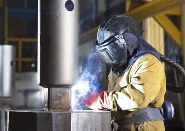 Liberty Speciality Steels worker preparing an ingot to go into the furnace vacuum arc remelting furnace Stocksbridge.