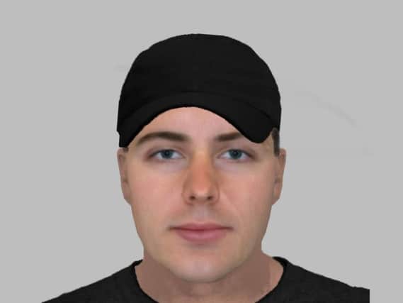 An e-fit image of a man police would like to speak to in connection with a theft in Kimberworth.