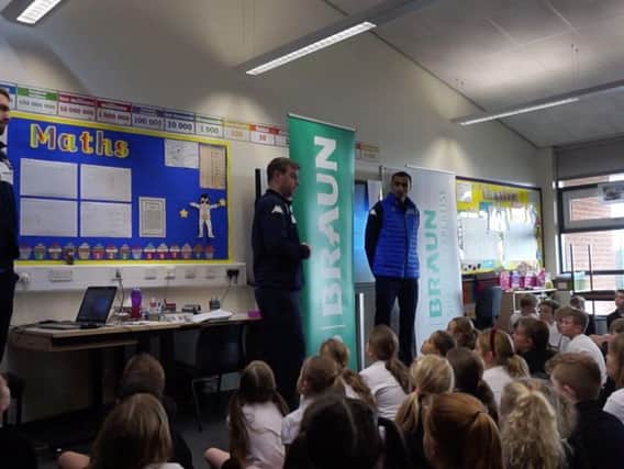 Anthoy Wroblicky, Joel Mills and Zach Gachette of Sheffield Sharks delivering a B Healthy B Braun session at Darton Primary School.