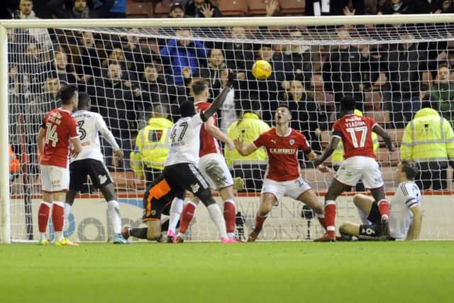 Barnsley v Fulham..Fulham player Kevin McDonald (right) scores to make to 2-1.27th January 2018 ..Picture by Simon Hulme