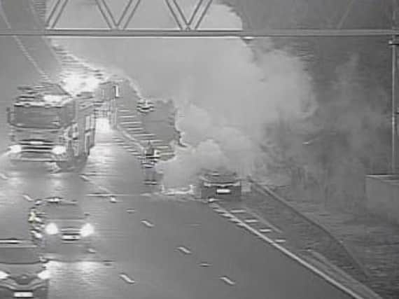 A car caught fire on the M1 this morning