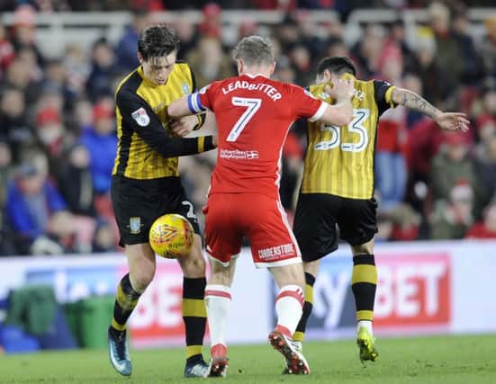 Middlesbrough's Grant Leadbitter blocks the way for Owls pair of Adam Reach and Ross Wallace....Pic Steve Ellis