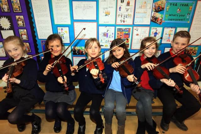 Violin students at the school