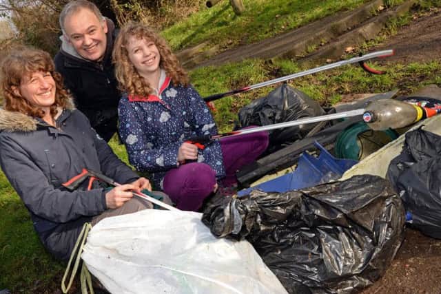 John Lamb, pictured with his wife Sue and daughter Alice, during the Let's De-Plastic litter picking event in Heeley Woods.