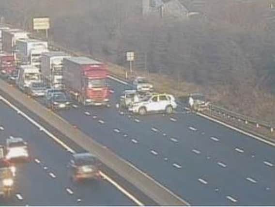 Motorists are facing delays on the M1 following a crash between junctions 33 and 34
