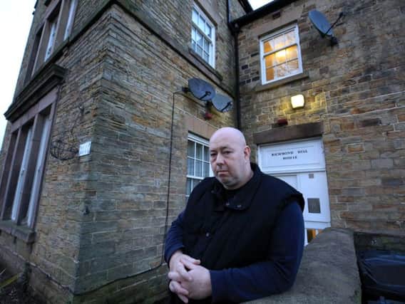 Mark Kelly outside Richmond Hill House, where he has lived for more than a decade