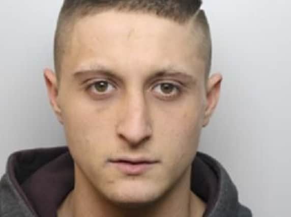 Adam Harrington, aged 21, is wanted by police in Sheffield