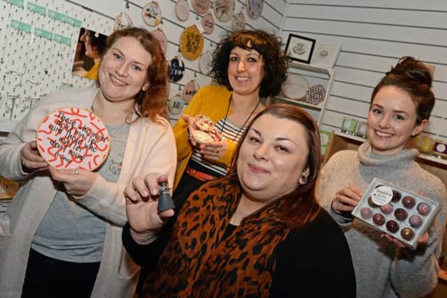 Ellie Mason, of Fizzy Pigg, Natalie Roberts, of Upsydaisy Craft, Jayne Harrison, of Maxwell Harrison Jewellery and Sorrel Botham, of Dandelion Cocoa, pictured at this years Pop-up Valentines shop in the Winter Gardens. Picture: Marie Caley NSST Valentines Pop-up MC 1