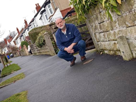 Mitchell Fry, pictured by the newly resurfaced footpaths on Whirlow Court Road, which residents say are turning into "ice rinks". Picture: Marie Caley