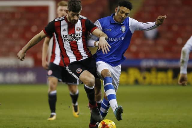 Ched Evans of Sheffield United and Sean Clare of Sheffield Wednesday during the U23 professional development league match at Bramall Lane Stadium, Sheffield. Simon Bellis/Sportimage