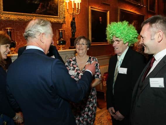 John was one of hundreds of Macmillan fundraisers and volunteers who met with Prince Charles at Buckingham Palace.