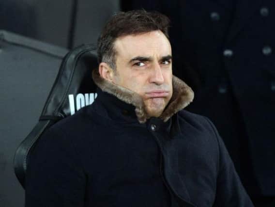 Carlos Carvalhal on the Swansea bench before the FA Cup fourth round replay against Notts County at the Liberty Stadium