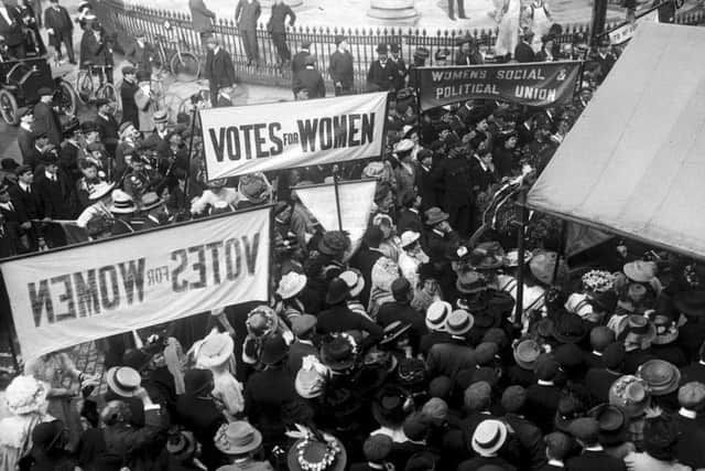 Suffragettes campaigning
