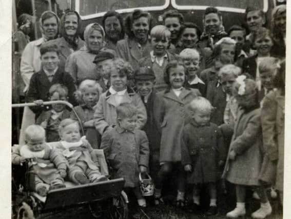 A pub trip to Cleethorpes from the British Oak at Carbrook. John Askham is near the front with his school cap on