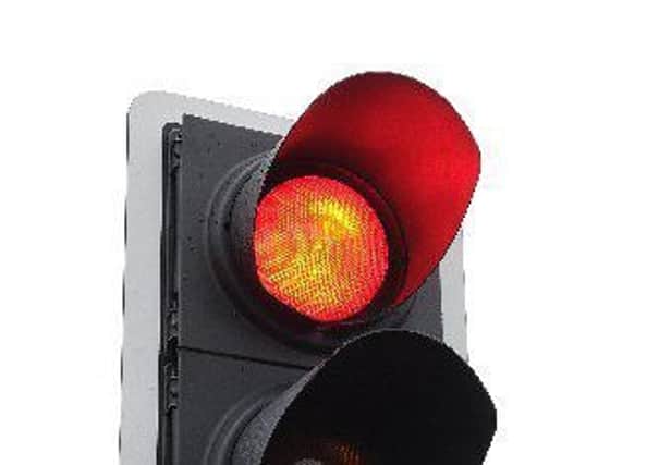 Pictured is a set of traffic lights.